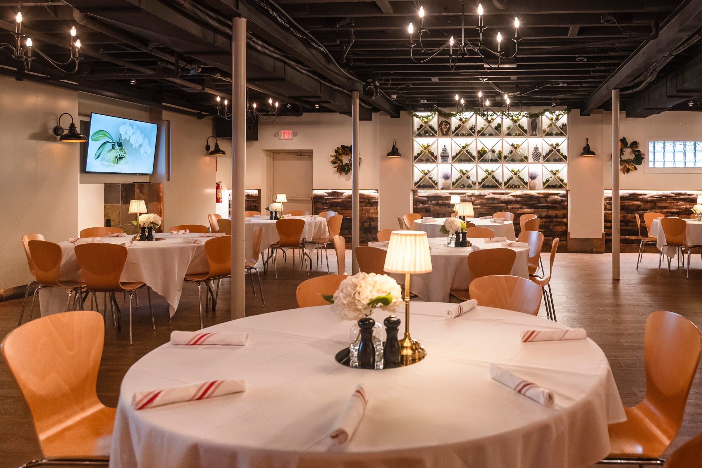 Private event room set with round tables at The Crown Tavern, Glen Mills, PA